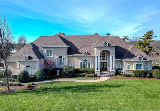 view of front of property with a front lawn