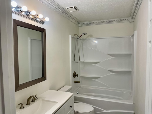 bathroom featuring a textured ceiling, toilet, visible vents, vanity, and washtub / shower combination