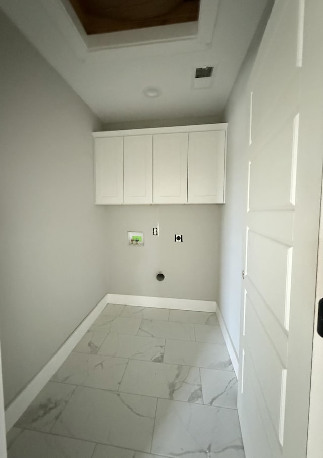 laundry room with washer hookup, electric dryer hookup, and cabinets