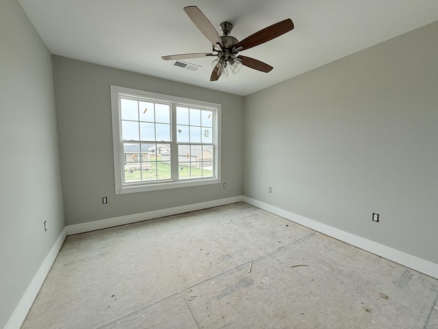 empty room featuring ceiling fan