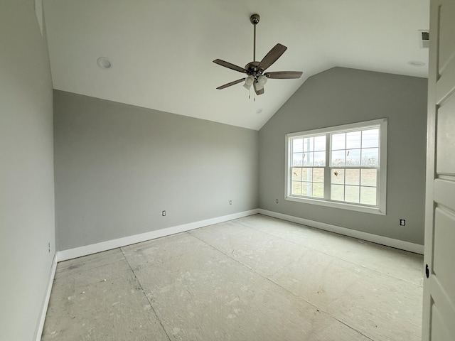 unfurnished room featuring ceiling fan and lofted ceiling