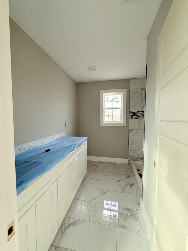 bathroom with a shower