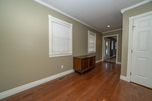 1280 Woodbury Loop, Morgantown, KY 42261 - spare room featuring dark hardwood / wood-style floors and crown molding
