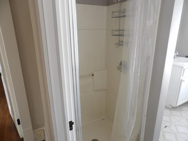 bathroom with vanity and a shower with curtain