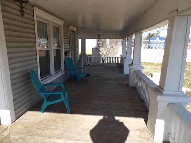 wooden deck featuring a porch