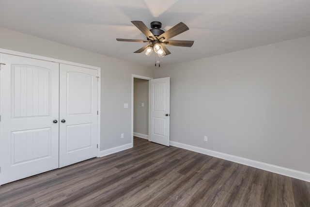 unfurnished bedroom featuring a closet, ceiling fan, and dark hardwood / wood-style floors