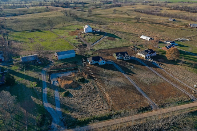 birds eye view of property featuring a rural view