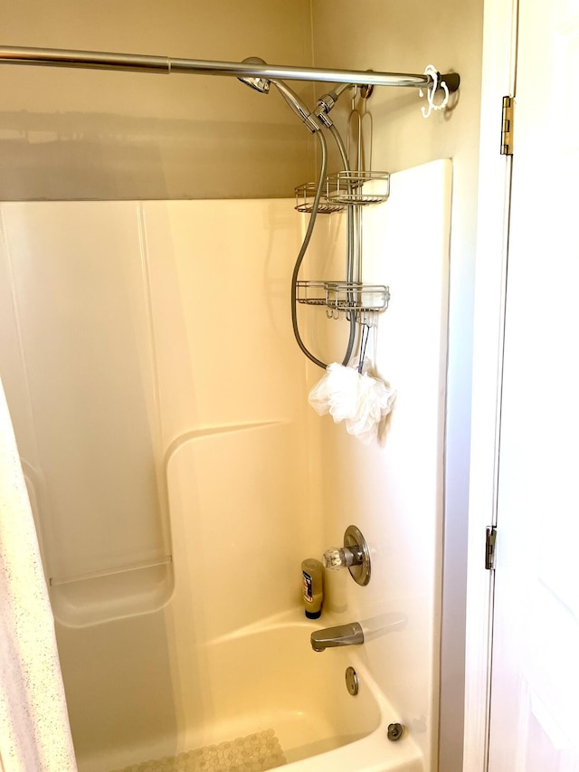 interior details with shower / bath combo with shower curtain