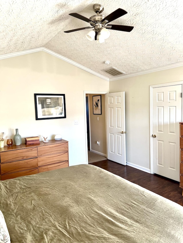 unfurnished bedroom with ceiling fan, crown molding, and lofted ceiling