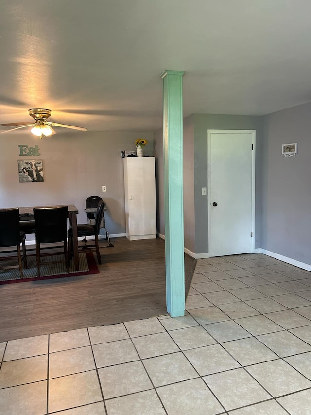 interior space featuring ceiling fan