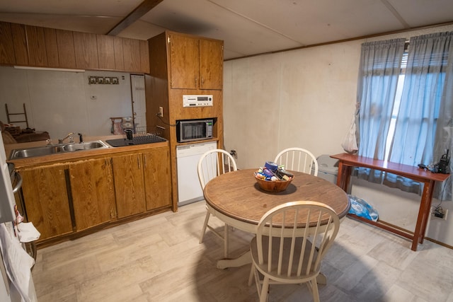 dining room featuring sink