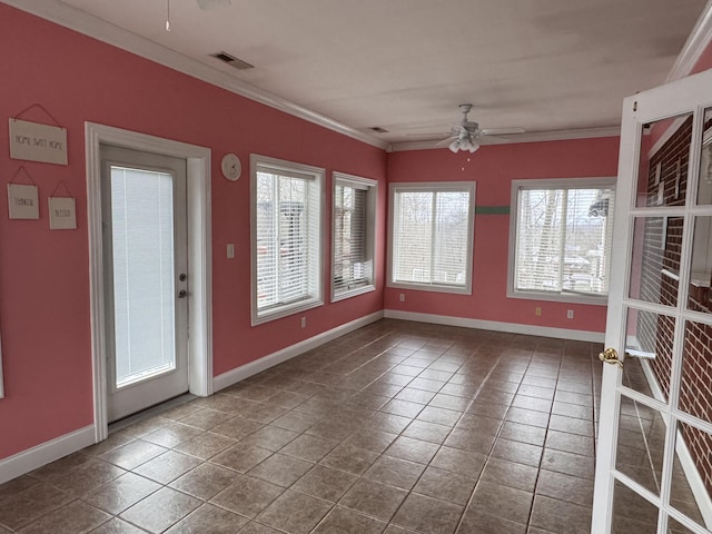 interior space with ceiling fan, a healthy amount of sunlight, and ornamental molding