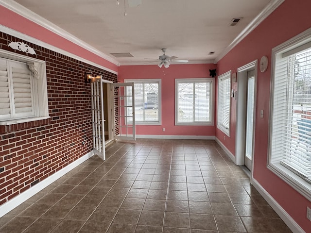 unfurnished sunroom with ceiling fan