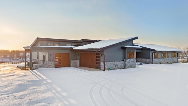 prairie-style house featuring a garage