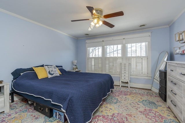 bedroom with ceiling fan and crown molding