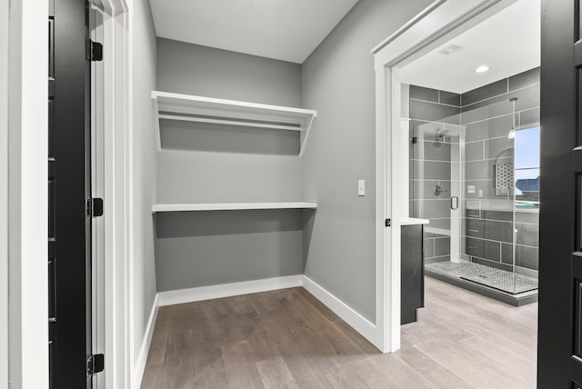 spacious closet with wood-type flooring