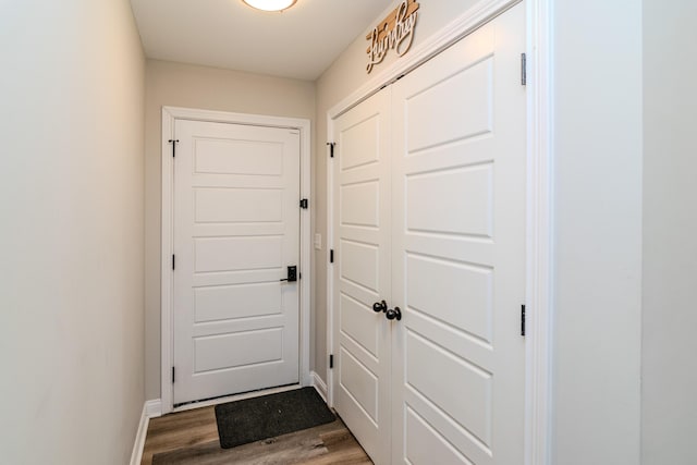 doorway with hardwood / wood-style floors