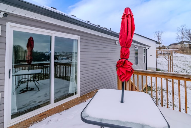 view of snow covered deck