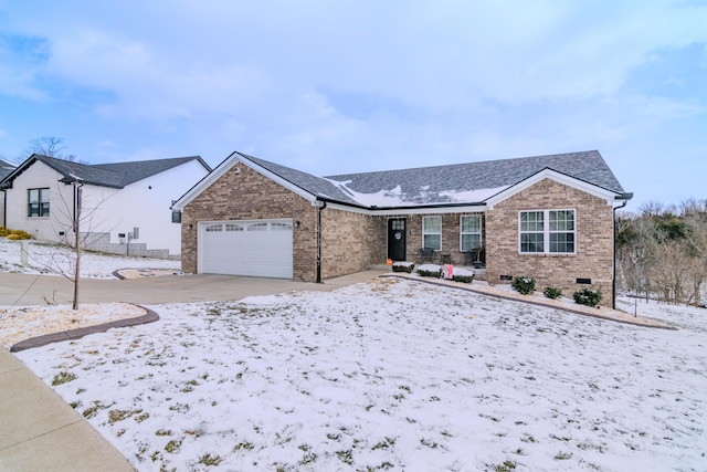 ranch-style house featuring a garage