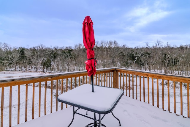 view of snow covered deck