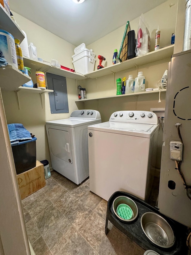 laundry area featuring washer and clothes dryer and electric panel