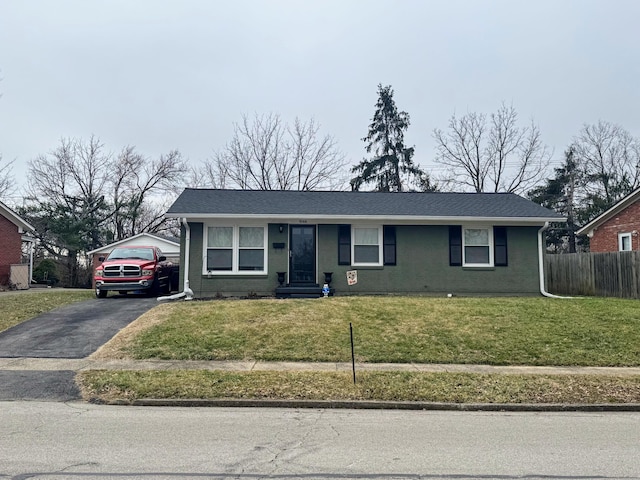 single story home featuring a front yard