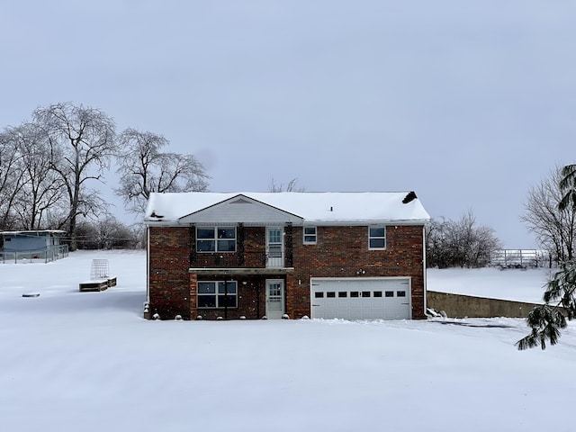 front facade with a garage