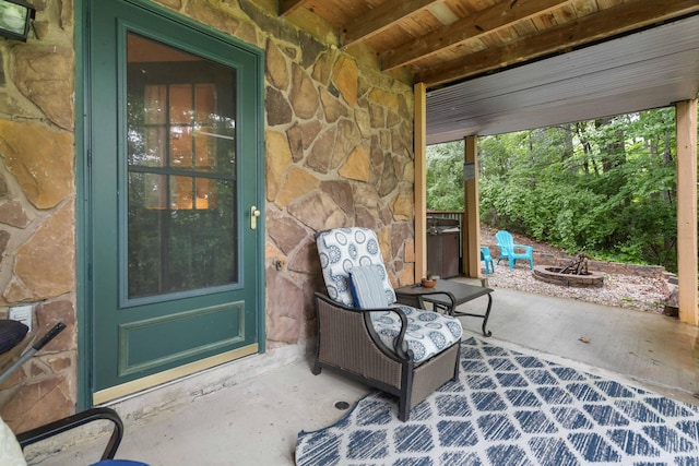 doorway to property featuring a patio