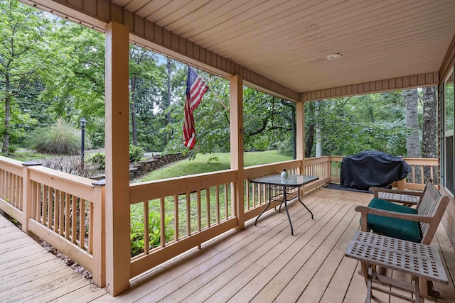 deck featuring a grill