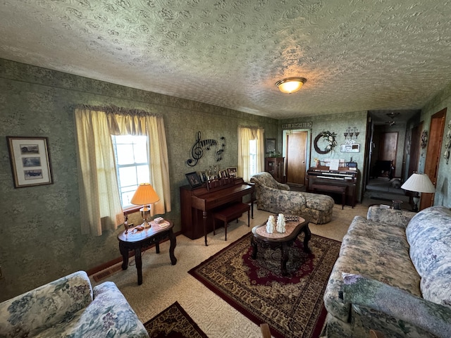 living room with a textured ceiling and carpet floors