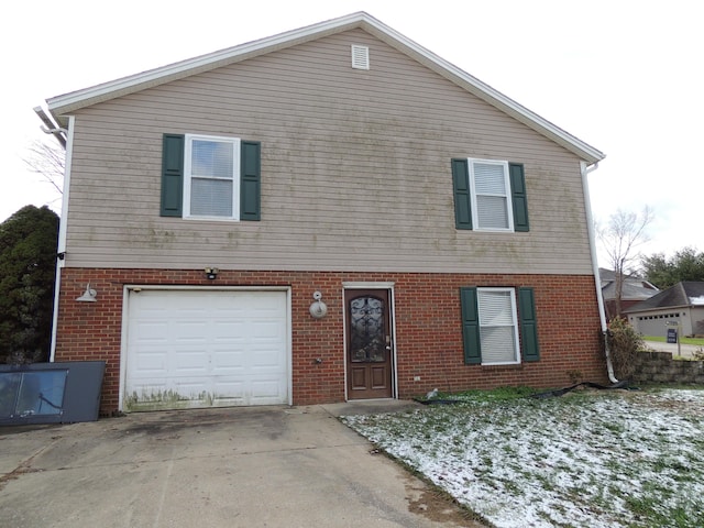 view of front of property with a garage