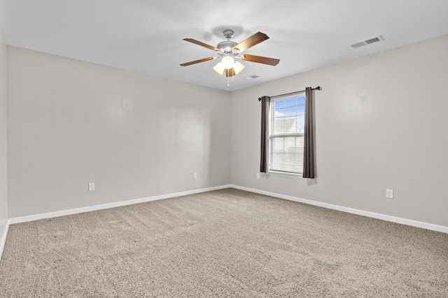 carpeted empty room with ceiling fan