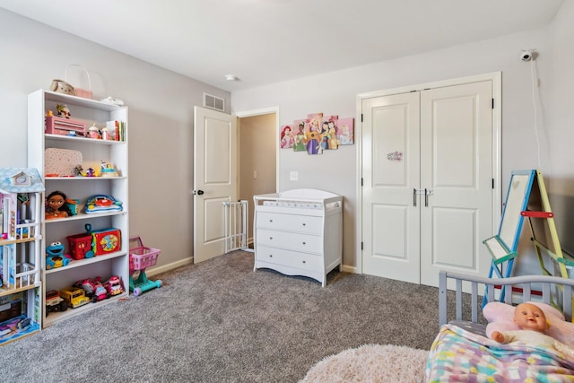 bedroom with a closet and carpet