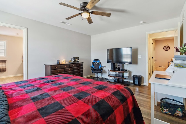 bedroom featuring hardwood / wood-style flooring and ceiling fan