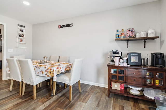 dining area featuring hardwood / wood-style flooring