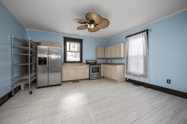 kitchen with ceiling fan, stainless steel appliances, a sink, ornamental molding, and light brown cabinetry