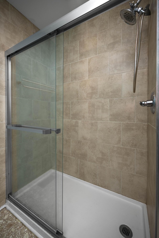 full bath featuring a stall shower