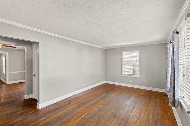 unfurnished room with crown molding, dark hardwood / wood-style flooring, and a textured ceiling