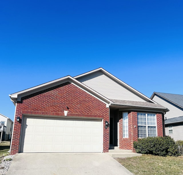 ranch-style home featuring brick siding, driveway, and a garage