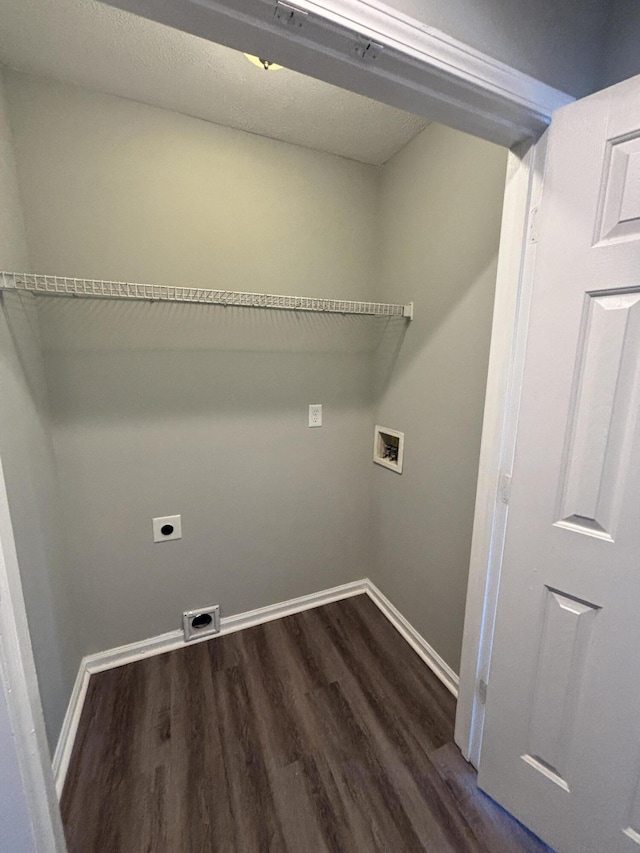 laundry area featuring washer hookup, dark hardwood / wood-style floors, and electric dryer hookup