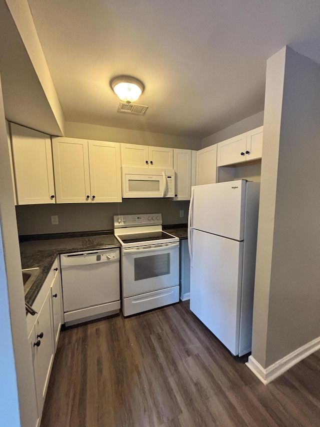 kitchen featuring white cabinetry, white appliances, and dark hardwood / wood-style floors