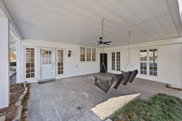 view of patio featuring ceiling fan