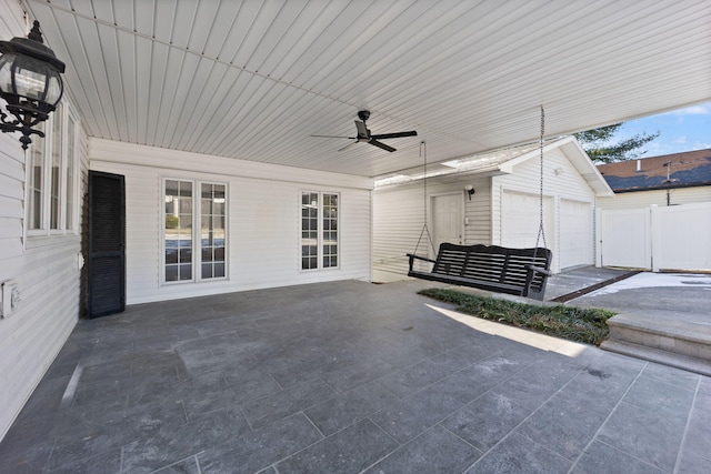 view of patio / terrace featuring ceiling fan