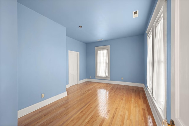 empty room featuring light hardwood / wood-style floors