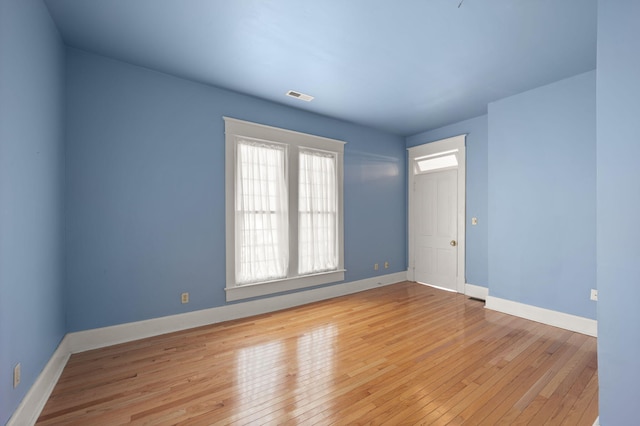 empty room featuring light wood-type flooring