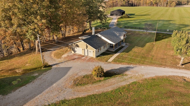 birds eye view of property featuring a rural view