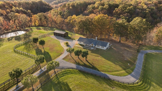 birds eye view of property featuring a rural view