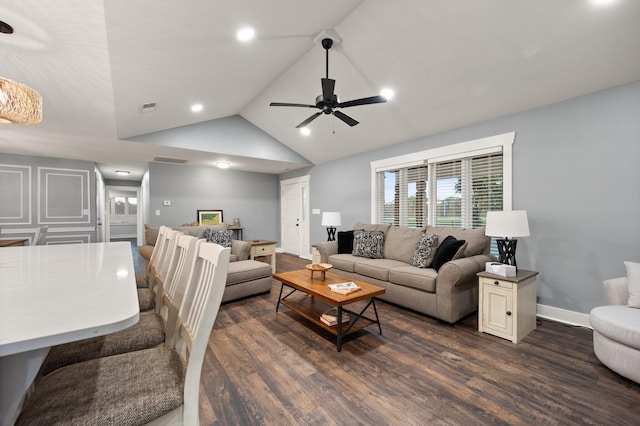 living room featuring lofted ceiling, ceiling fan, and dark hardwood / wood-style floors