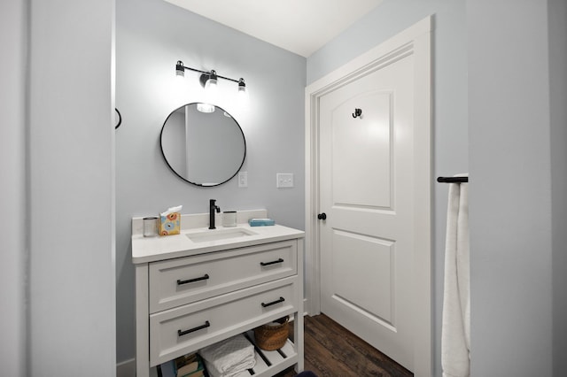 bathroom featuring wood-type flooring and vanity