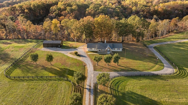 birds eye view of property featuring a rural view